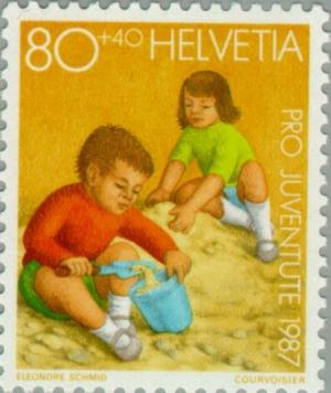 Colnect-140-958-Children-playing-in-a-sandbox.jpg