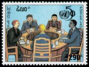 Colnect-4264-831-UN50-Men-seated-at-round-table.jpg