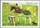 Colnect-813-285-Horseman-on-horse-over-hurdle.jpg