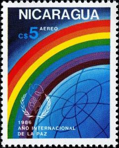 Colnect-5702-472-Globe-rainbow-emblem.jpg