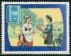 Colnect-1612-511-Postwoman-delivering-mail.jpg