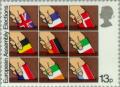 Colnect-122-121-Hands-placing-National-Flags-in-Ballot-Boxes---13p.jpg