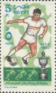 Colnect-3354-343-El-Mokawiloon-Club-white-uniform-1983.jpg