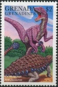 Colnect-3089-059-Deinonychus-Ankylosaurus.jpg