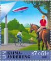 Colnect-139-237-Cyclist-Rider-on-Horse-Equus-ferus-caballus-Airship.jpg