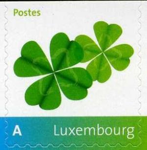 Colnect-1243-872-Four-leaf-clovers.jpg