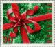 Colnect-141-357-Ribbon-around-a-christmas-present.jpg