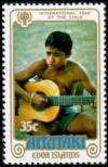 Colnect-3338-043-Boy-playing-guitar.jpg