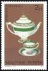 Colnect-900-684-Teapot-cup-and-saucer.jpg