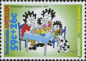 Colnect-1016-687-Family-Praying-at-dinner-table.jpg