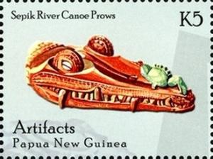 Colnect-2553-241-Sepik-River-canoe-prow-in-shape-of-crocodile--s-head.jpg