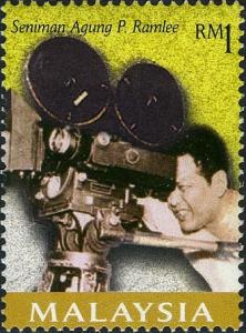 Colnect-2111-499-Tan-Sri-P-Ramlee--Using-film-camera.jpg