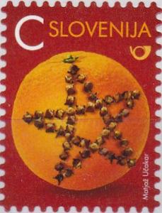 Colnect-3641-948-Orange-with-Cloves.jpg