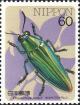 Colnect-2608-827-Metallic-Wood-boring-Beetle-Chrysochroa-holstii.jpg