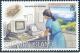 Colnect-3979-819-Woman-with-printer-at-Satellite-Station.jpg