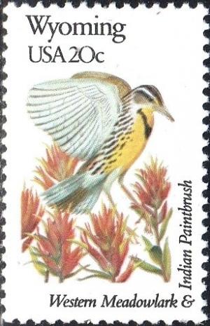 Colnect-4136-400-Wyoming---Western-Meadowlark-Indian-Paintbrush.jpg