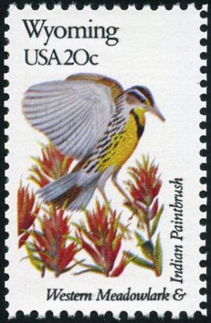 Colnect-5097-163-Wyoming---Western-Meadowlark-Indian-Paintbrush.jpg