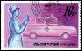 Colnect-3528-941-Nurse-and-ambulance.jpg