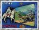 Colnect-3343-878-Man-on-horseback-horse-drawn-cart.jpg