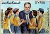 Colnect-3663-532-Assad-with-children.jpg