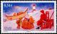 Colnect-878-871-Santa-and-Elves.jpg