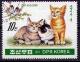 Colnect-723-849-Cats-Felis-silvestris-catus-and-Bird.jpg