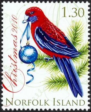 Colnect-3790-936-Crimson-Rosella-nbsp-Platycercus-elegans-with-bauble.jpg