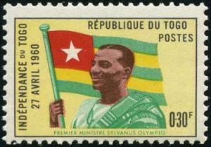 Colnect-572-657-Prime-minister-Sylvanus-Olympio-and-Togo-Flag.jpg