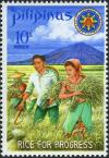 Colnect-2238-216-President-and-Mrs-Marcos-harvesting-miracle-rice.jpg