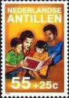 Colnect-954-053-Parents-reading-to-children.jpg