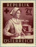 Colnect-136-374-Red-Cross-nurse--amp--ambulance.jpg