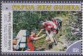 Colnect-5997-851-Guides-assisting-a-Trekker.jpg