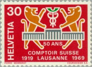 Colnect-140-366-Two-lions--amp--Comptoir-badge.jpg