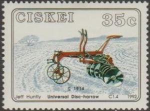 Colnect-3502-624-Farm-implements-John-Deere-disc-harrow-1914.jpg