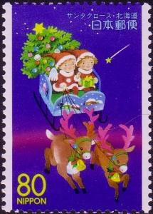 Colnect-2179-469-Santa-Claus-and-Sleigh.jpg