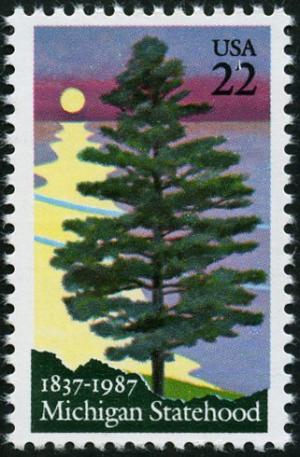 Colnect-4848-526-150-Years-Michigan-Statehood-White-Pine-next-to-Sun-Set.jpg