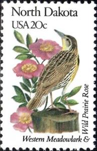 Colnect-4136-386-North-Dakota---Western-Meadowlark-Wild-Prairie-Rose.jpg