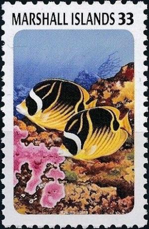 Colnect-2967-097-Raccoon-Butterflyfish-Chaetodon-lunula.jpg