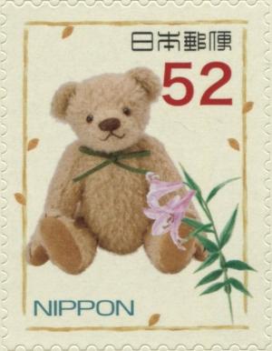 Colnect-3046-556-Beige-Teddy-Bear-and-Lilium.jpg