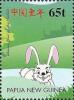 Colnect-2220-922-White-rabbit-grinning.jpg