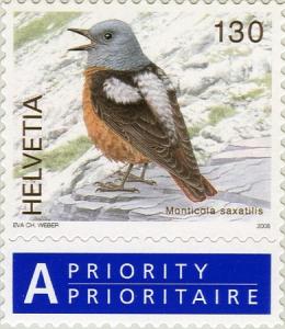 Colnect-693-069-Common-Rock-Thrush-Monticola-saxatilis.jpg