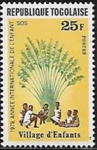 Colnect-5528-308-Children-sitting-under-African-fan-palm.jpg