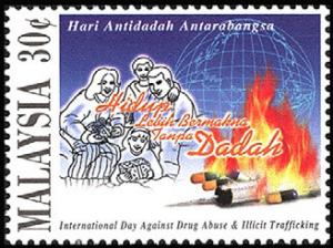 Colnect-1052-691-Intl-Day-against-Drug-Abuse--Family-and-globe.jpg