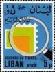 Colnect-1382-613-Stamp-under-magnifyng-glass.jpg