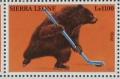 Colnect-1873-932-Brown-Bear-Ursus-arctos-playing-Hockey.jpg