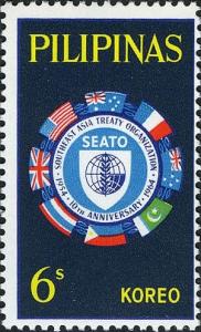 Colnect-2112-508-Flags-surrounding-SEATO-emblem.jpg