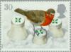 Colnect-123-064-European-Robin-Erithacus-rubecula-on-Snowcovered-Milk-Bott.jpg