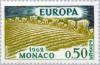 Colnect-147-885-Word-EUROPA-over-field-with-grain-sheaves.jpg