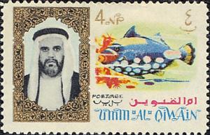 Colnect-2409-539-Sheik-with-clown-triggerfish.jpg