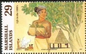 Colnect-1923-267-Woman-breadfruit.jpg